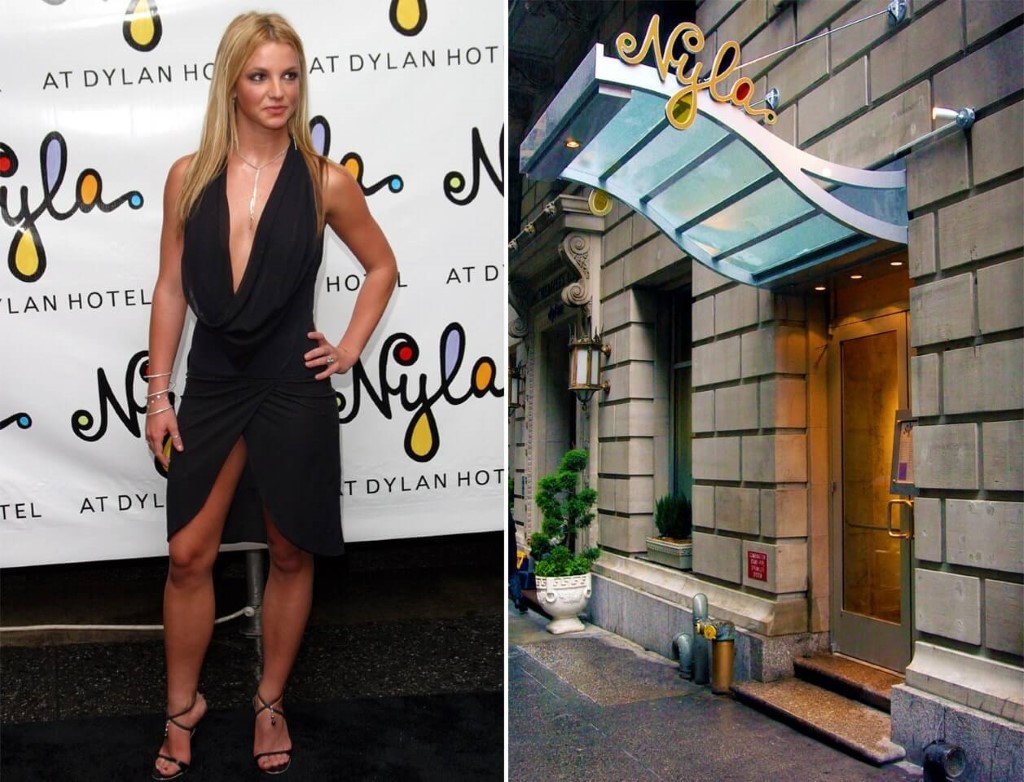 A person holding a sign posing for the camera
Description automatically generated